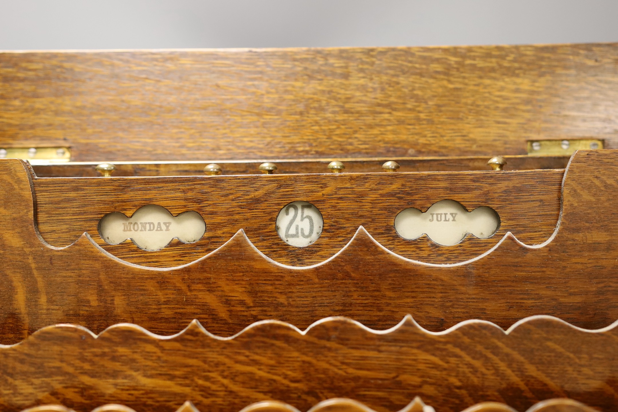 An Edwardian oak two door stationary box, 36 cms high